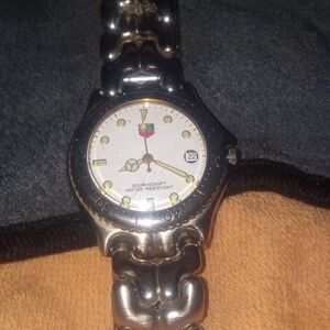 Tag Heuer Silver Watch with White Dial Swiss Made 1000 Ft Water Resistant